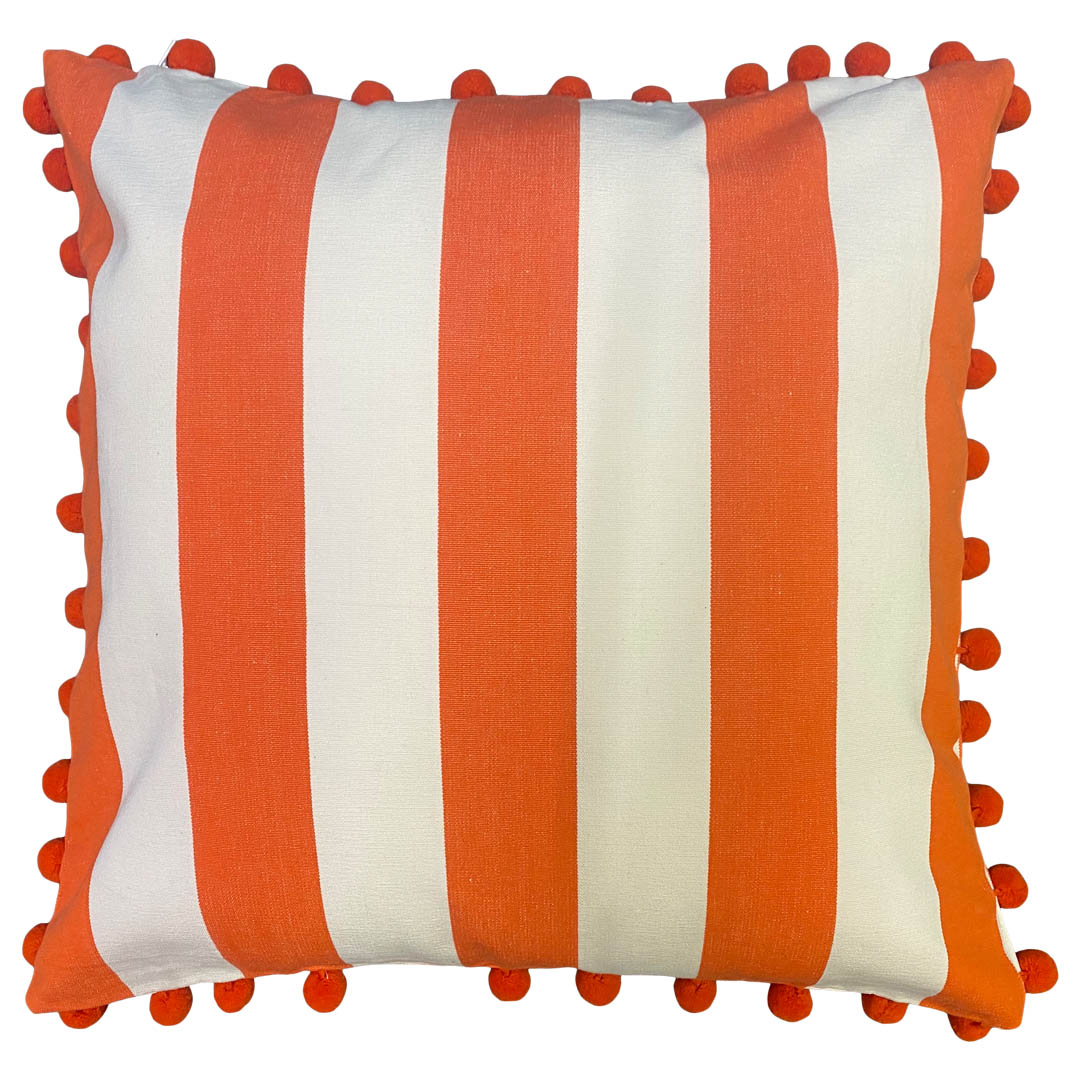 orange pom pom cushion